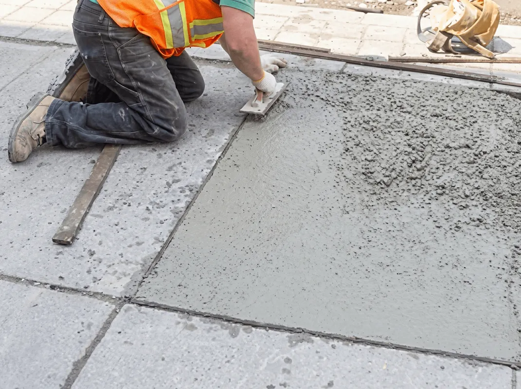 Professional repairing a concrete floor in Colorado Springs, CO