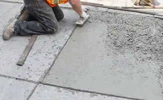 Professional repairing a concrete floor in Colorado Springs, CO