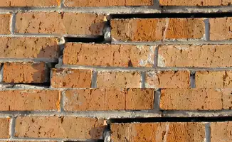 Brick wall with serious structural damage in Colorado Springs, CO